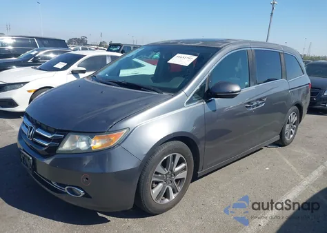 2014 Honda Odyssey Touring/Touring Elite из США, поврежденный, VIN 5FNRL5H9XEB033224